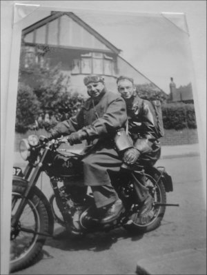 Father Albert and son Paul on bike